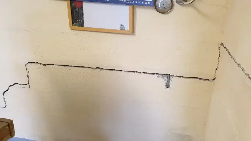 fissure en escalier immeuble en copropriété sous sol